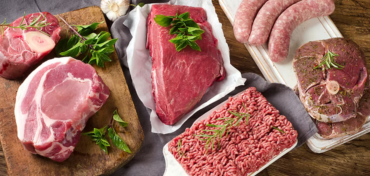 different cuts of beef on a butcher block