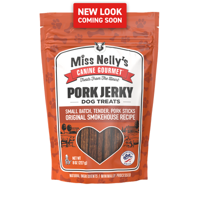 Miss Nelly's Canine Gourmet Pork Jerky dog treats packaging with 'New Look Coming Soon' label.